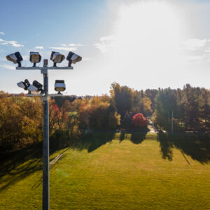 Multiple KSL2 STRATOS mini fixtures atop a spun concrete pole. This project is at a baseball diamond in Drayton, Ontario.
